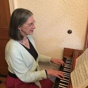 Janet playing her harpsichord